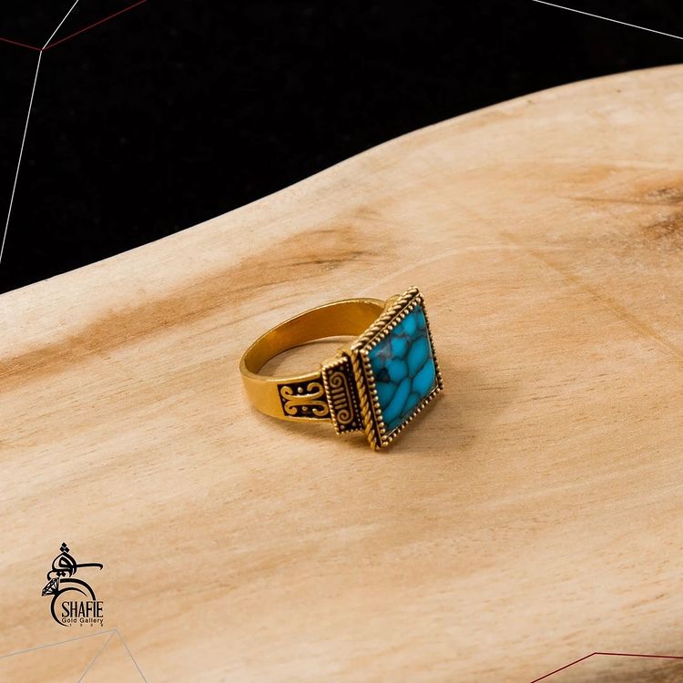 مدل های انگشتر طلای زنانه با نگین فیروزه.jpg